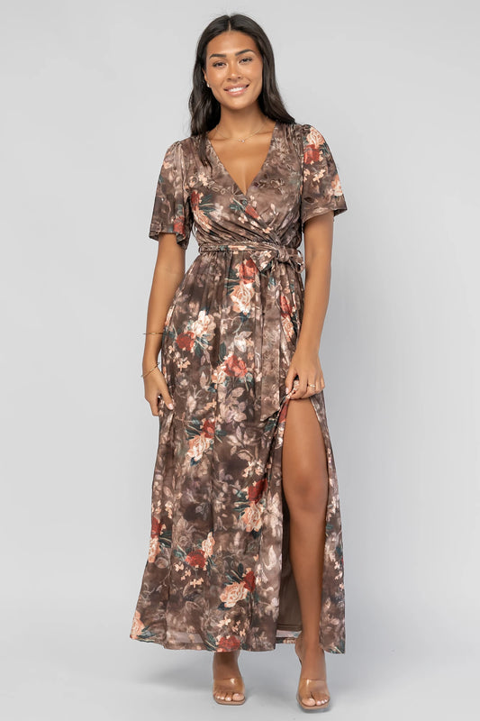 Uma Velvet Maxi Dress in Brown Floral with a burnout mesh overlay, crossover V-neckline, and a side leg slit.