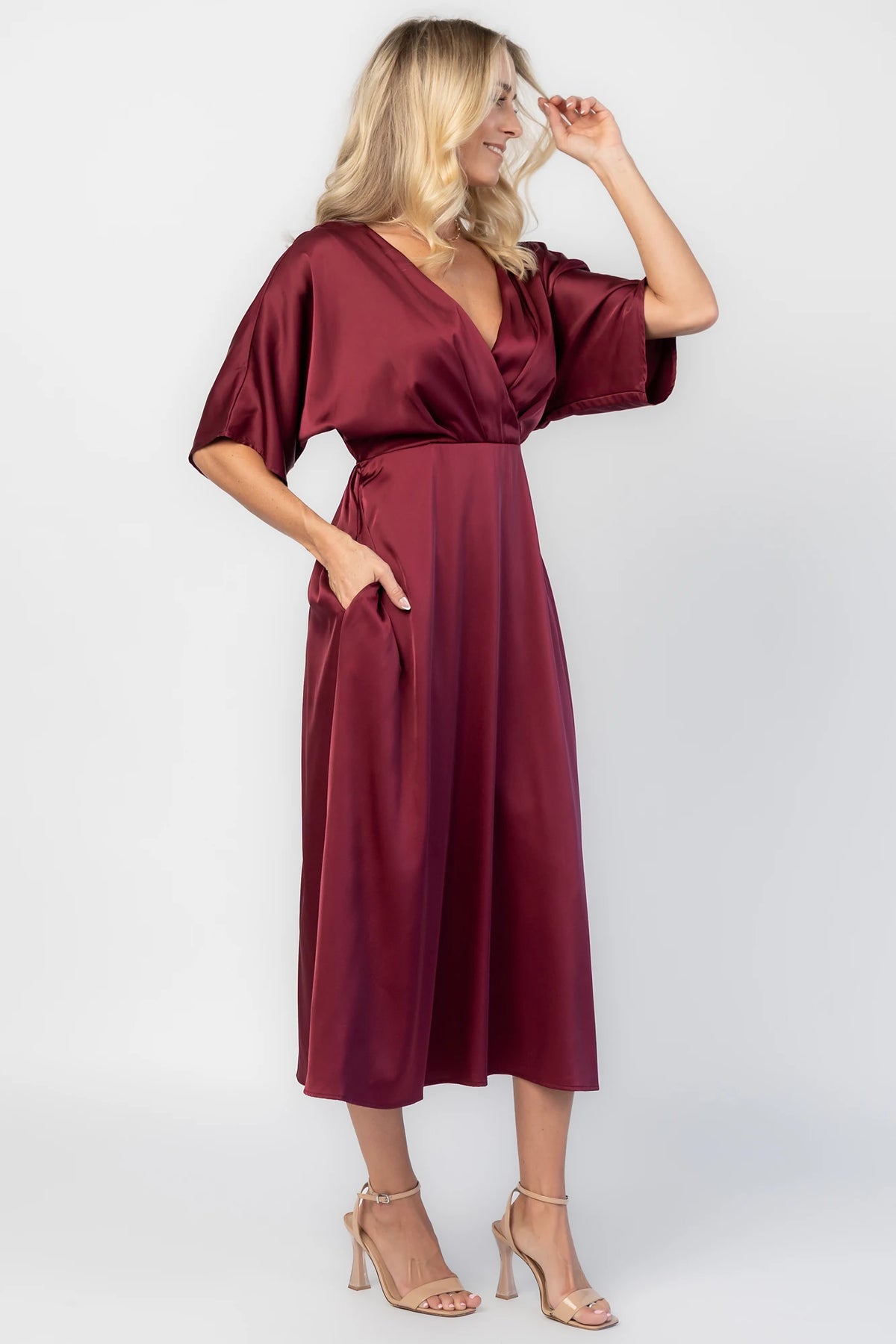 Veda Midi Dress in Burgundy with V-neckline, adjustable back tie, and hidden side pockets.