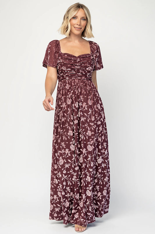 Veloura Maxi Dress in Mulberry Floral with sweetheart neckline, flutter sleeves, ruched bust, smocked back, and velvet florals.