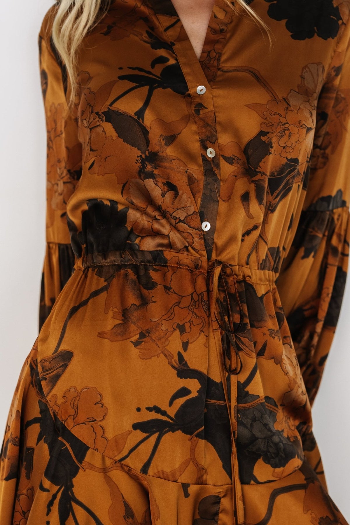 Venice Short Dress in Deep Gold Floral with mandarin collar, button front, puff sleeves, drawstring waist, and ruffle hem.