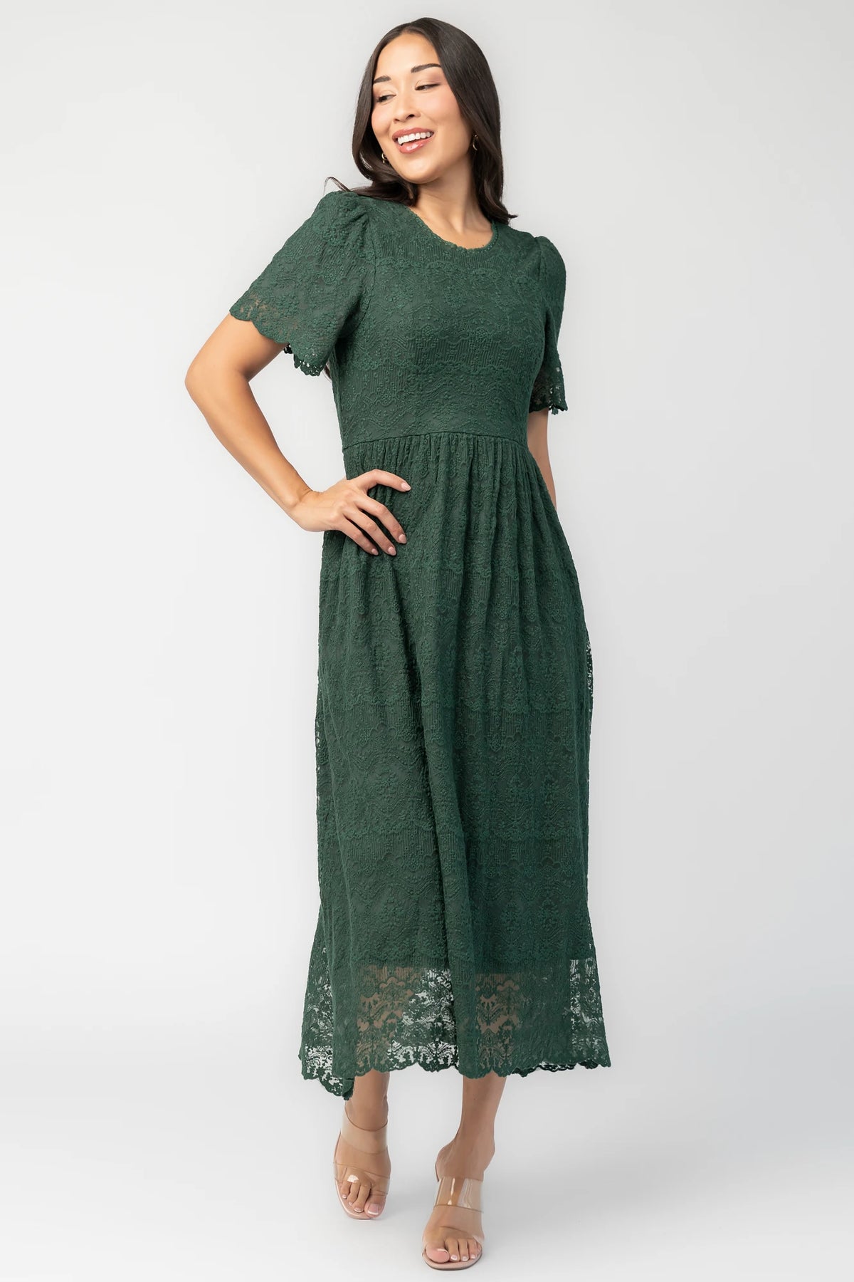 Yvaine Lace Midi Dress in Emerald with embroidered lace, scalloped neckline, short sleeves, and scalloped hem.
