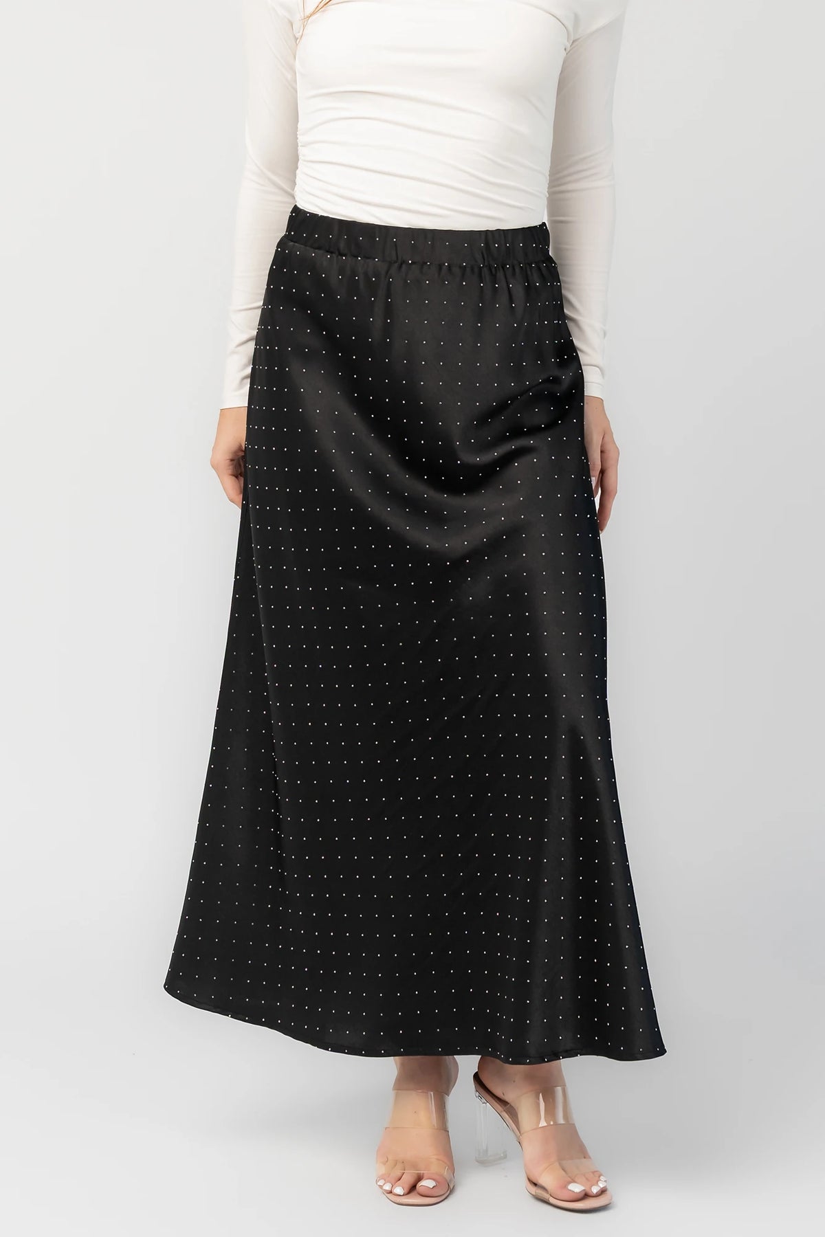 Zaylee Skirt in Black with rhinestone embellishments, elastic waistband, and flowing maxi silhouette.