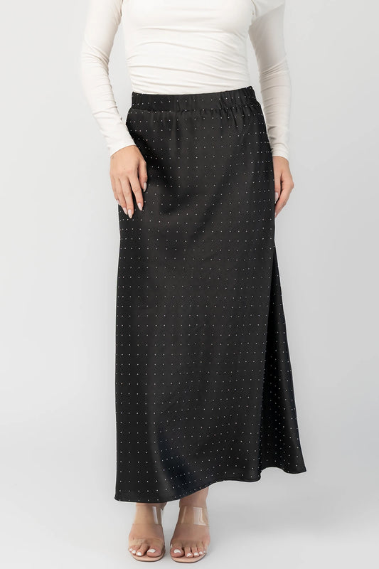 Zaylee Skirt in Black with rhinestone embellishments, elastic waistband, and flowing maxi silhouette.