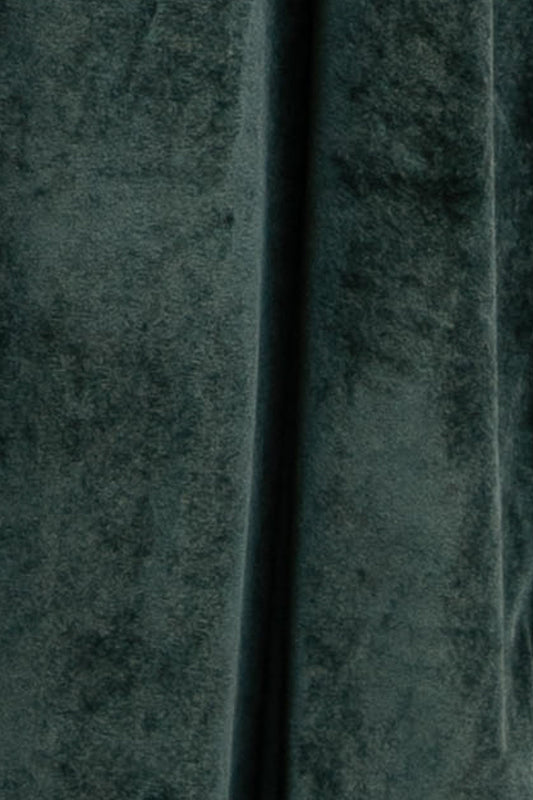 Close-up of Deep Green Meghan velvet swatch (approx. 3 x 4 in), showing pile texture, nap, and slight stretch to assess drape.