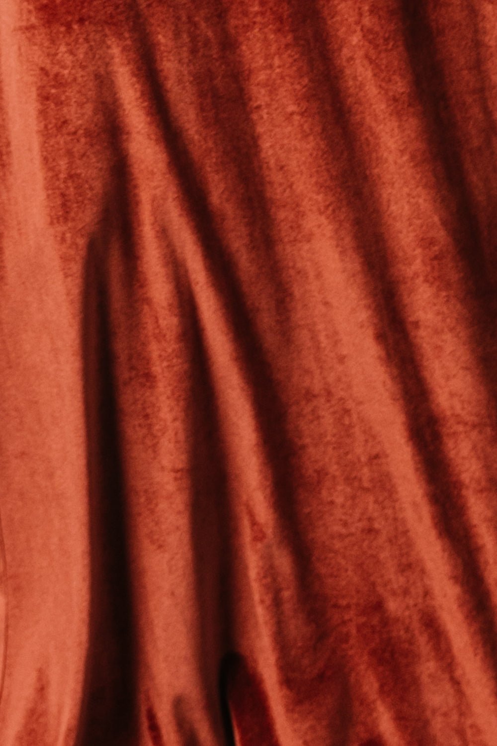 Terracotta Meghan velvet fabric swatch, mid-weight pile with slight stretch; 3x4 in color sample for matching.