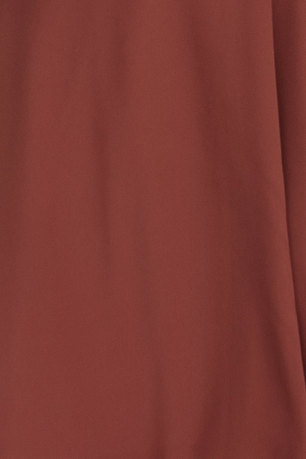 Close-up front view of a Cinnamon-colored Naomi chiffon fabric swatch showing lightweight, sheer texture and true-to-color 3 x 4 inch sample for evaluation.