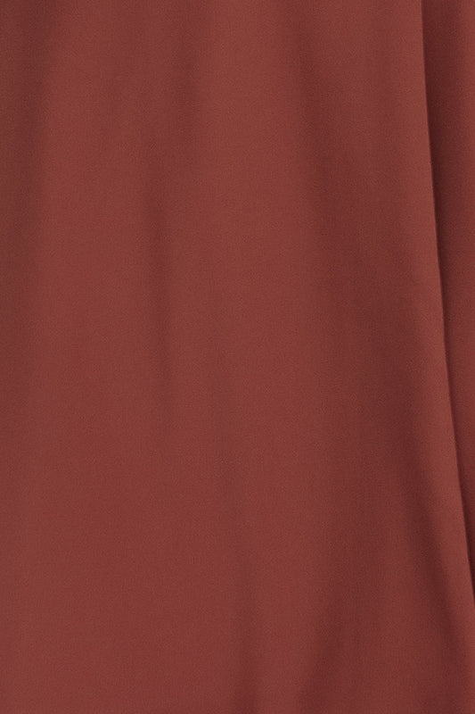Close-up front view of a Cinnamon-colored Naomi chiffon fabric swatch showing lightweight, sheer texture and true-to-color 3 x 4 inch sample for evaluation.