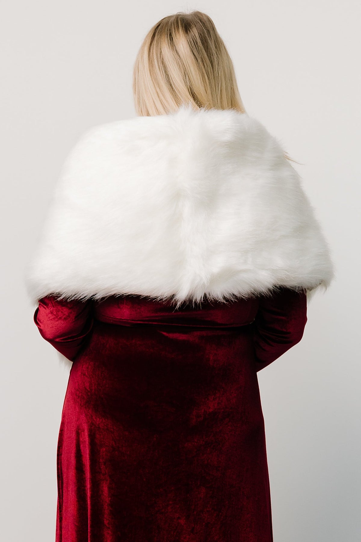 Close-up detail of plush faux fur texture and satin lining edge on the Pearl shawl, emphasizing soft pile and finish.