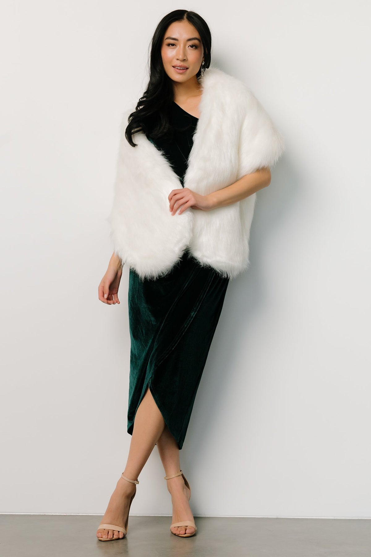 Pearl faux fur shawl arranged flat to show lining and hook-and-eye closure placement, suitable for styling reference.