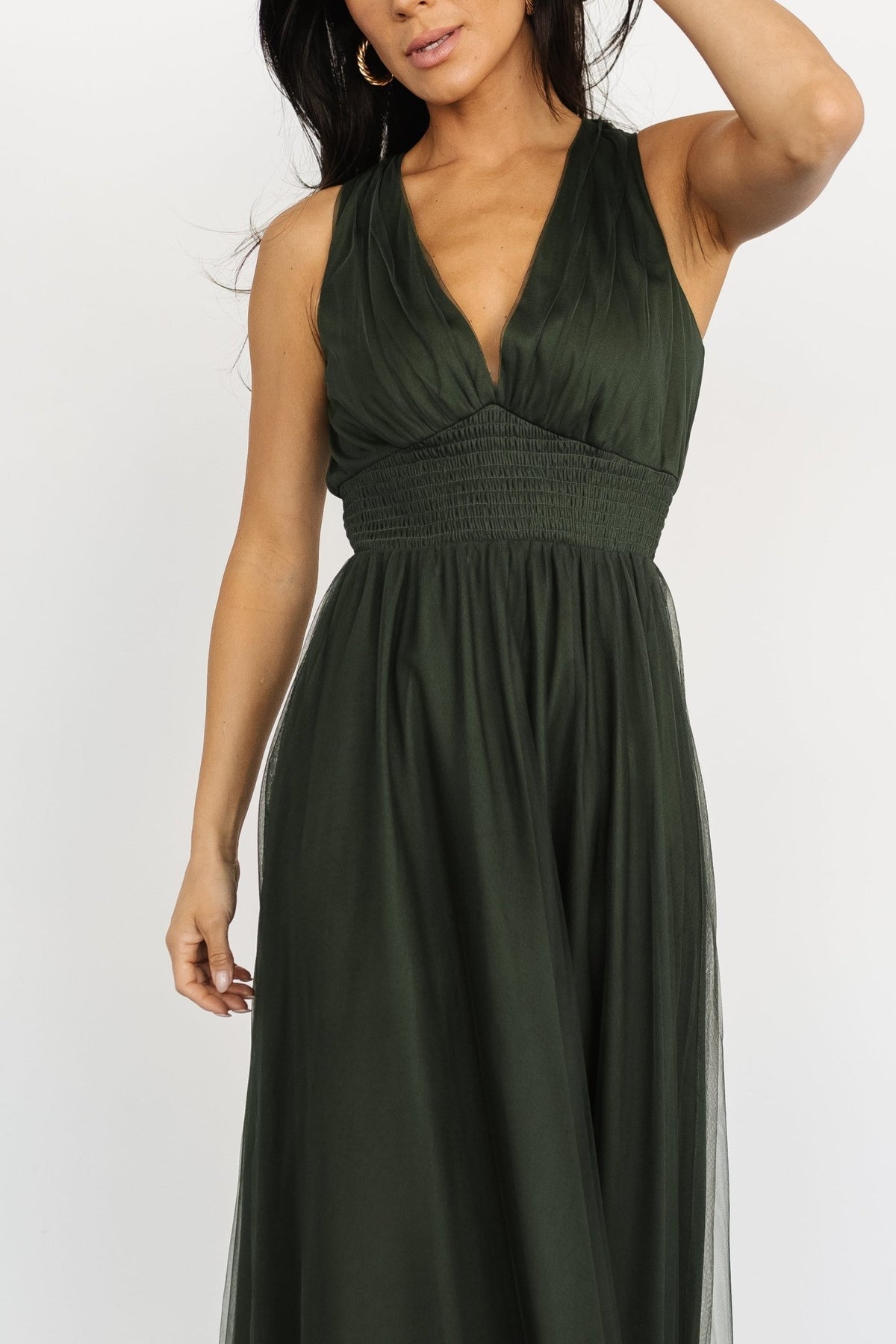 Full-length portrait of Kamila Tulle Maxi Dress in Juniper Green; showcases length, neckline, tank sleeves, and ethereal drape of the tulle skirt.