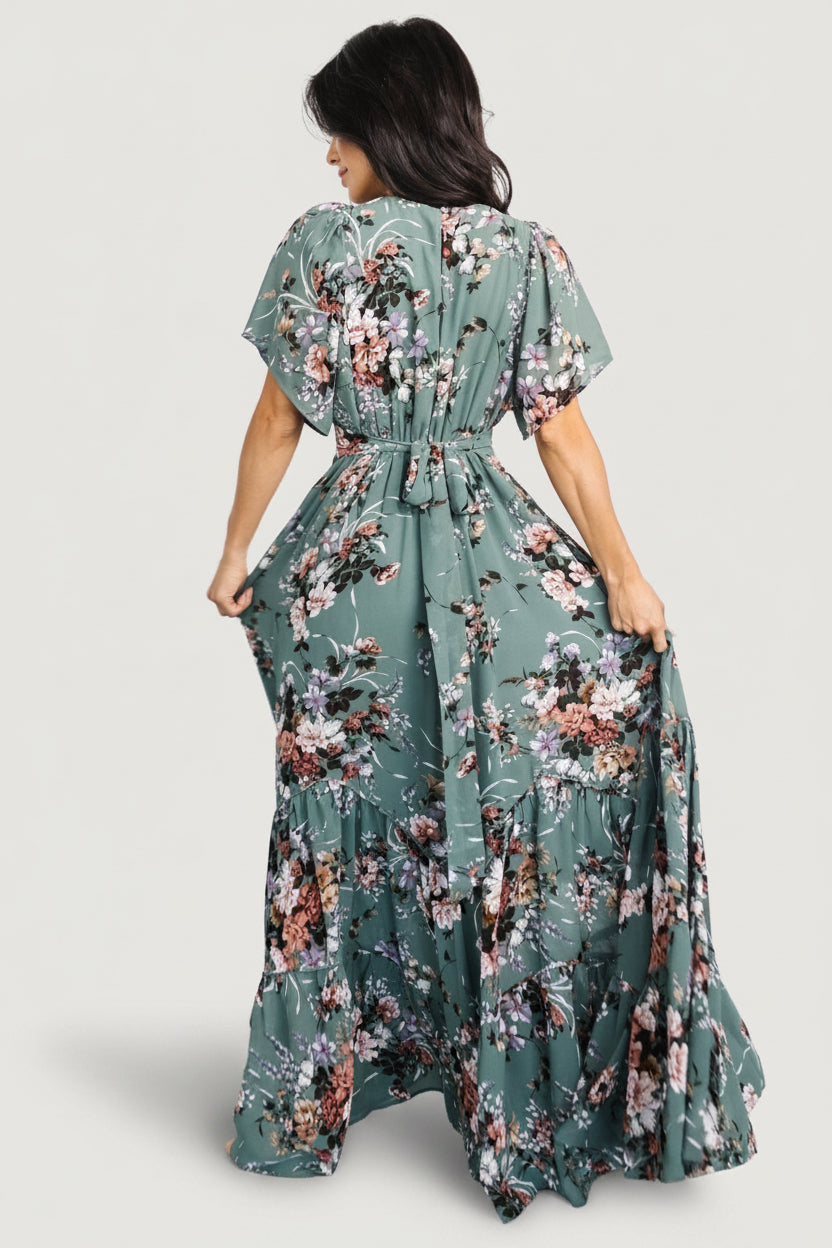 Fabric and pattern close-up of the Katherine Maxi Dress in dusty green floral showing print scale, muted color palette, and chiffon texture.