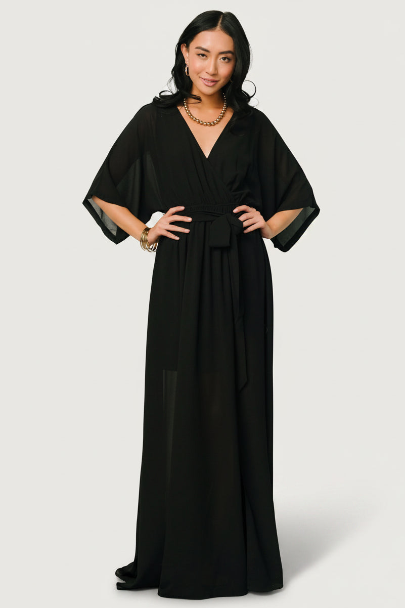 Back view of Kia Kimono Maxi Dress in black showing relaxed silhouette, elasticized waistband and graceful skirt length.