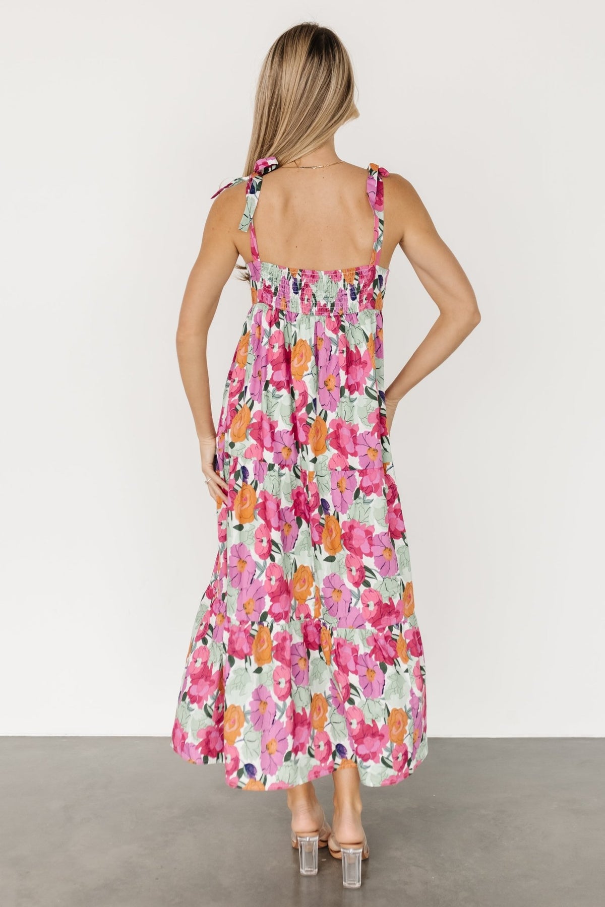 Model wearing the Lakewood Tie Dress showing overall fit and length, styled with flat sandals for a casual look.
