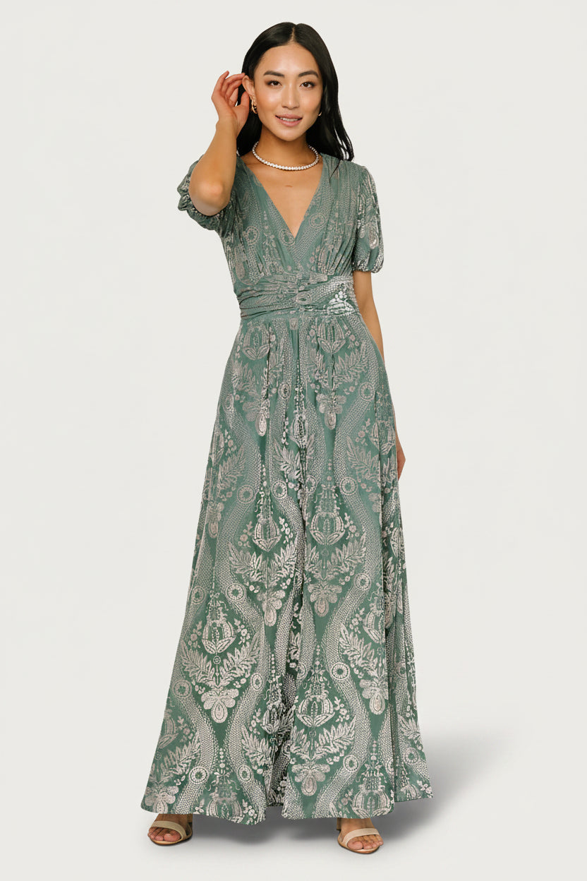 Full-length side view of Leslie Velvet Maxi Dress in Sage + Silver highlighting the flowing hem, side pockets, and relaxed drape.
