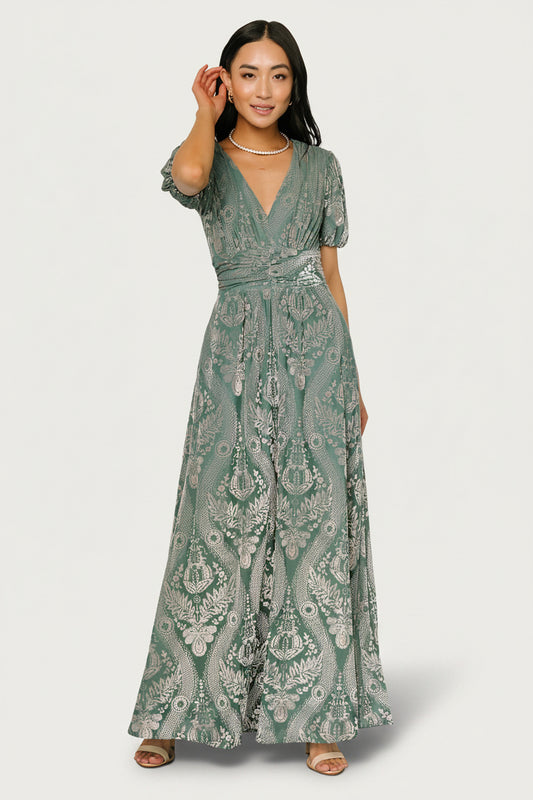 Full-length side view of Leslie Velvet Maxi Dress in Sage + Silver highlighting the flowing hem, side pockets, and relaxed drape.