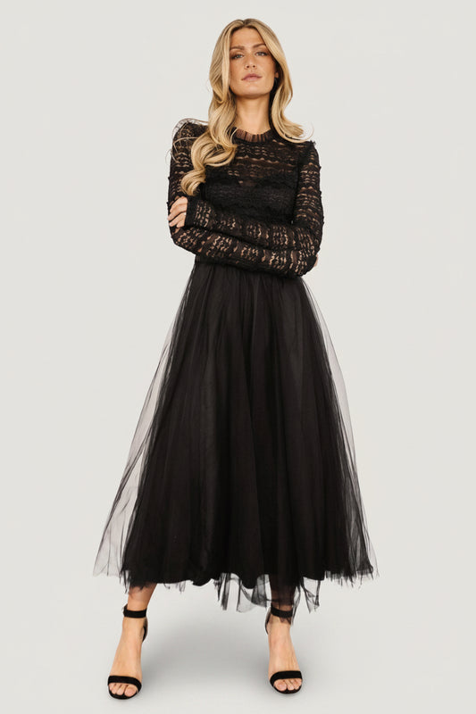 Close-up of the lace bodice and sweetheart-lined inner of the Lonnie Tulle Dress in black, showing ruffle detail, delicate stitching and subtle texture.