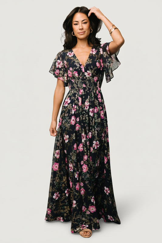 Close-up of the Lynlee dress fabric and print in dark blue with pink accents, highlighting metallic thread detail and lightweight chiffon texture.