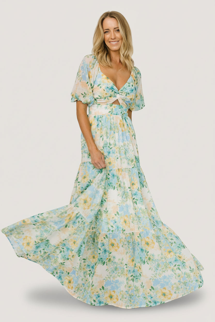 Front view of model wearing Maya Maxi Dress in Garden Multi floral chiffon, showing sweetheart neckline, keyhole knot, and tiered skirt.
