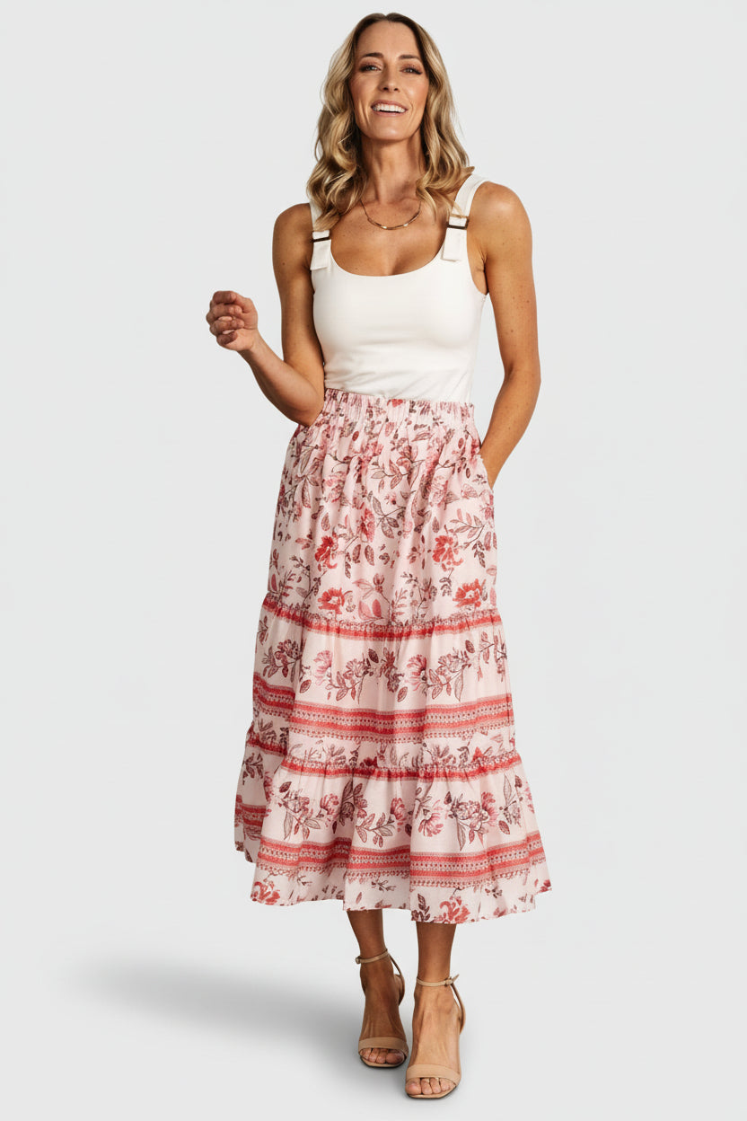 Styled outfit image with Meg blush multi skirt paired with a casual top, illustrating versatile wear from daytime to dressier occasions.