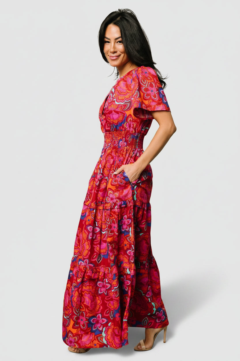 Back view of Palmer Tiered Maxi Dress revealing tiered ruffles, full maxi length, and lightweight unlined cotton construction in multi floral.