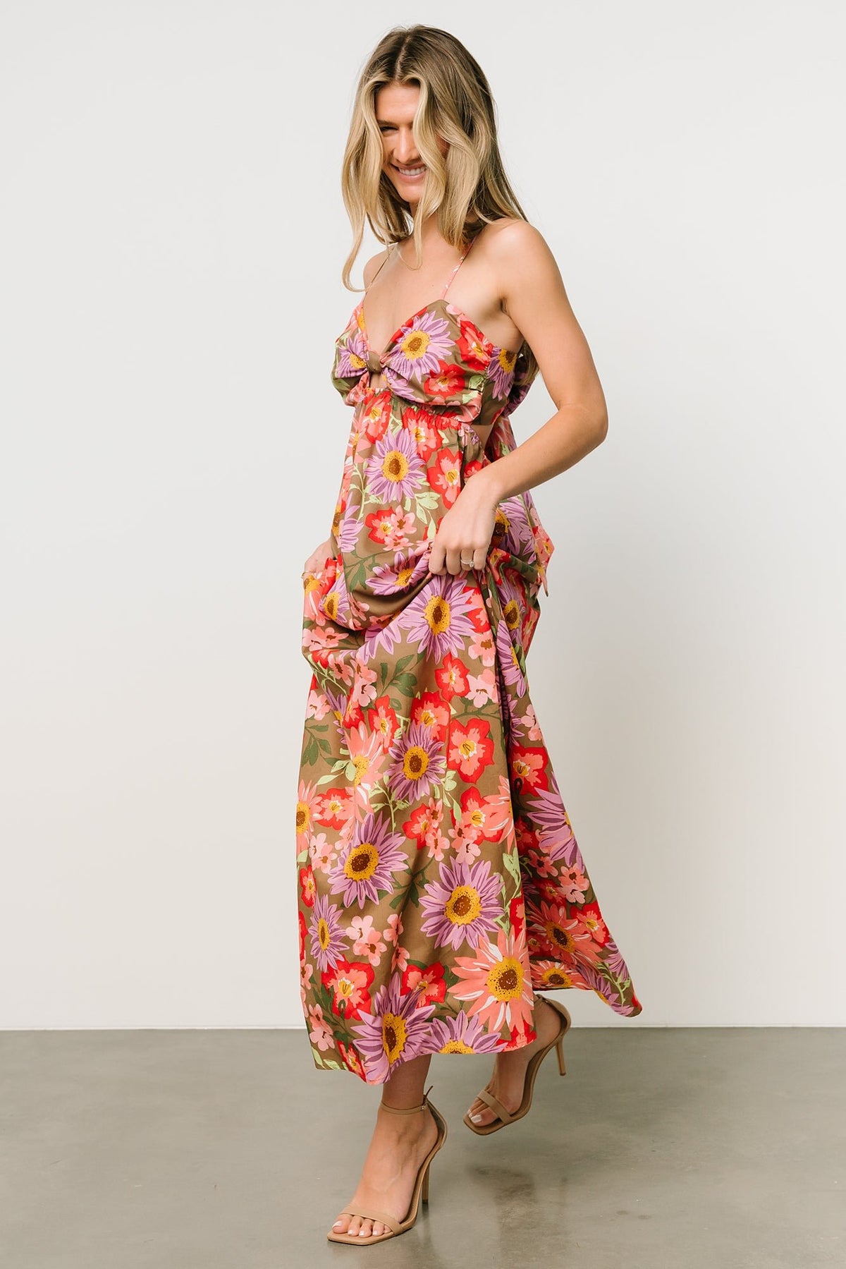 Detail of Rosalee dress fabric showing cotton texture and multicolor floral print, ideal for breathable warm-weather wear.
