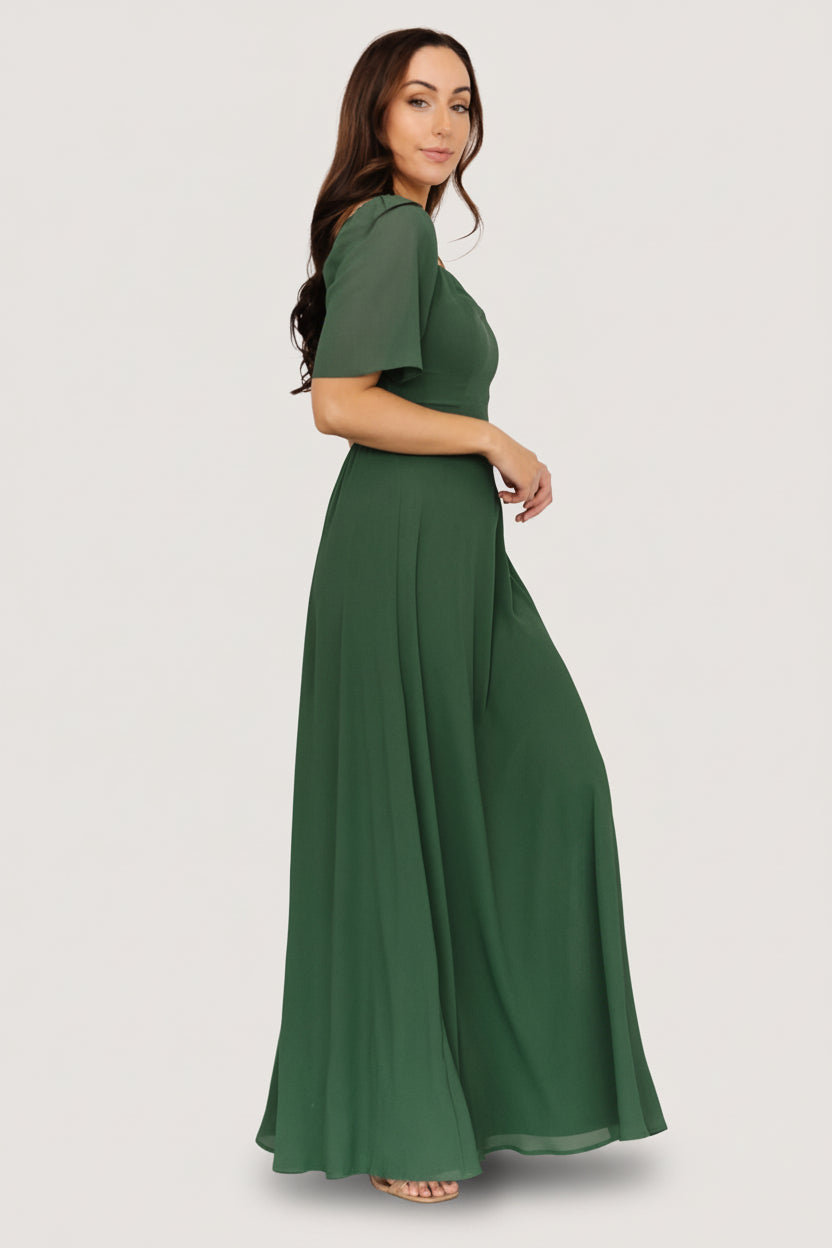 Back view of Sierra Sweetheart Maxi Dress in evergreen, displaying smocked back bodice and elastic shoulder detail for a flexible fit.