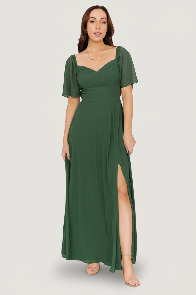 Full-length shot of Sierra Sweetheart Maxi Dress in evergreen, highlighting the off-shoulder sleeves, smocked bodice, and natural drape.